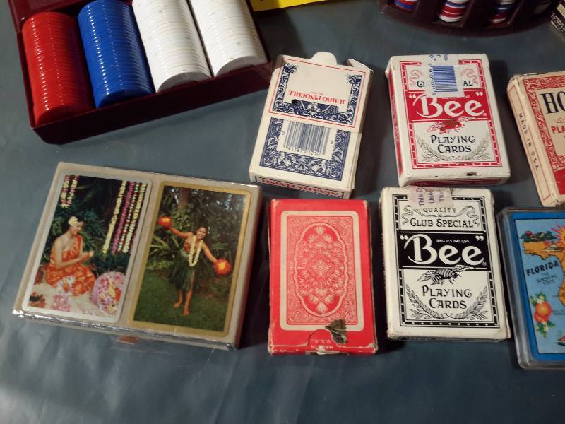 lot 136 image: Lot of playing cards and poker chips as pictured