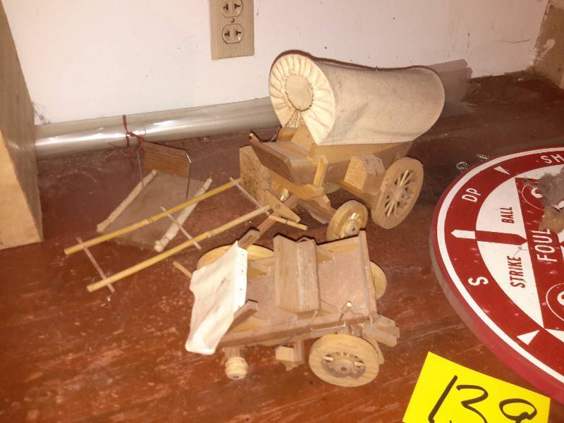lot 139 image: Dart board and darts (one spear missing)  Parts of wood covered wagon models