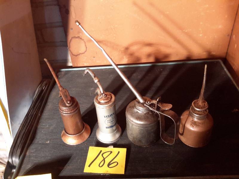 lot 186 image: 6 vintage oil cans (2 not shown)