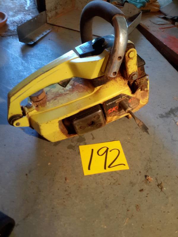 lot 192 image: Maple Syrup drill. Looks like a chain saw that has been adapted to drilling sap holes.. Untested