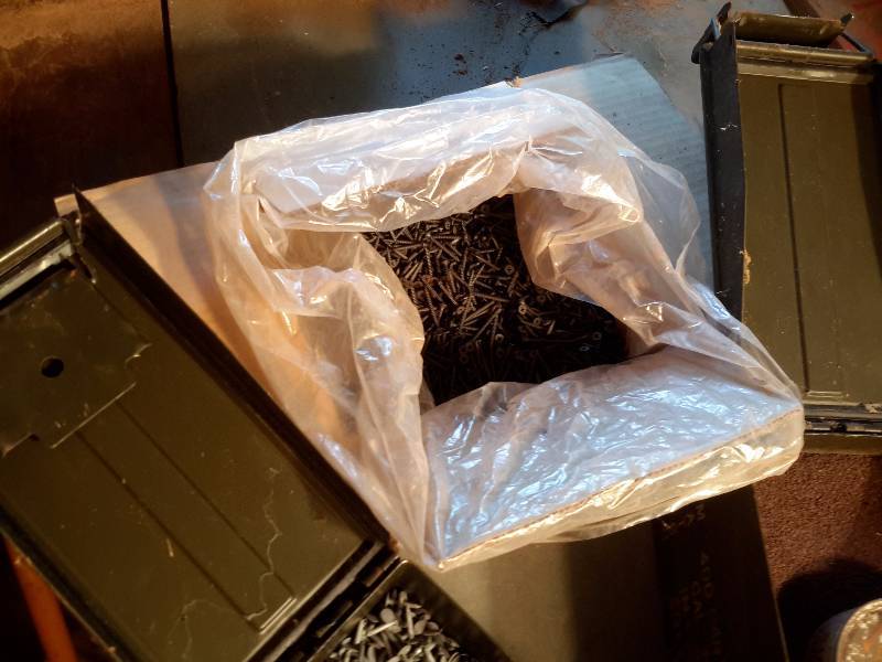 lot 180 image: Large lot of screws and nails as shown.. Empty metal storage drawer