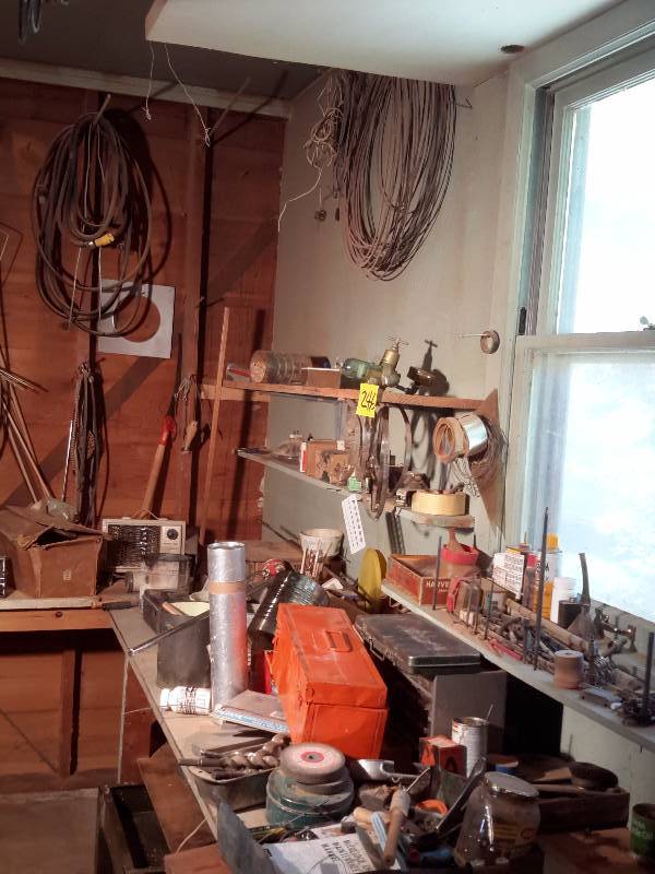 lot 246 image: HUGE LOT OF EVERYTHING ON THE SHELVES and Work Bench.. ON, UNDER..