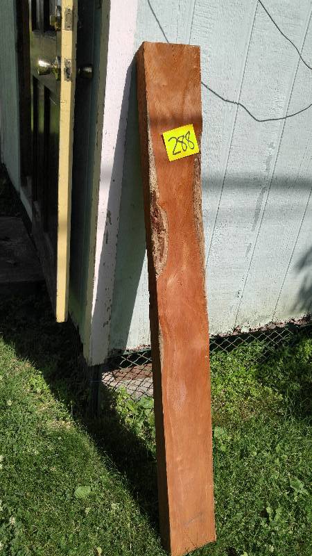 lot 288 image: 4 ft x 3 12 in x 5 12 in piece of Reddish Hardwood