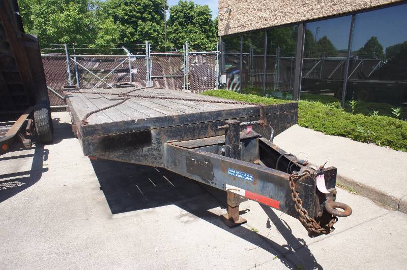1986 FELLING TRAILER - BED IS 8 WIDE X 19 LONG - WITH TONGUE 24 LONG - HAS RAMPS - WOOD BED NICE TRAILER