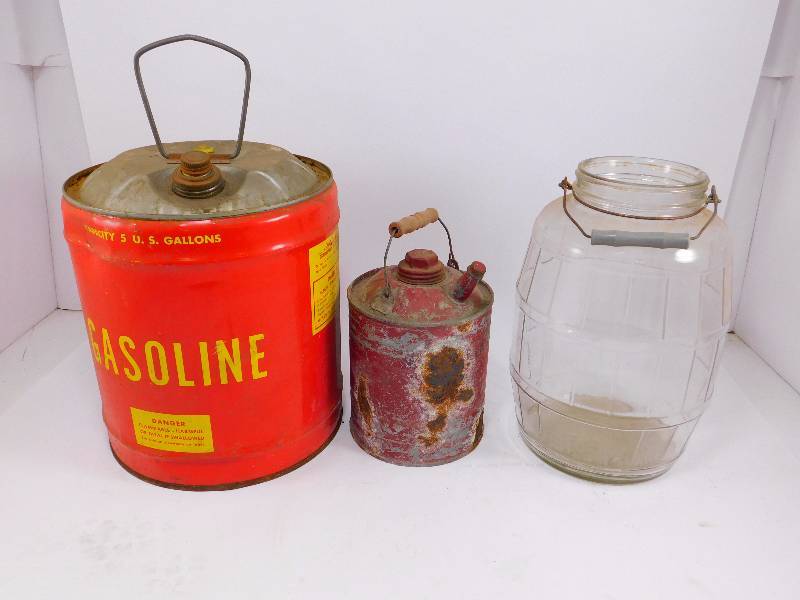 lot 37 image: (2) Metal Gas Cans and 1 Glass Jar
