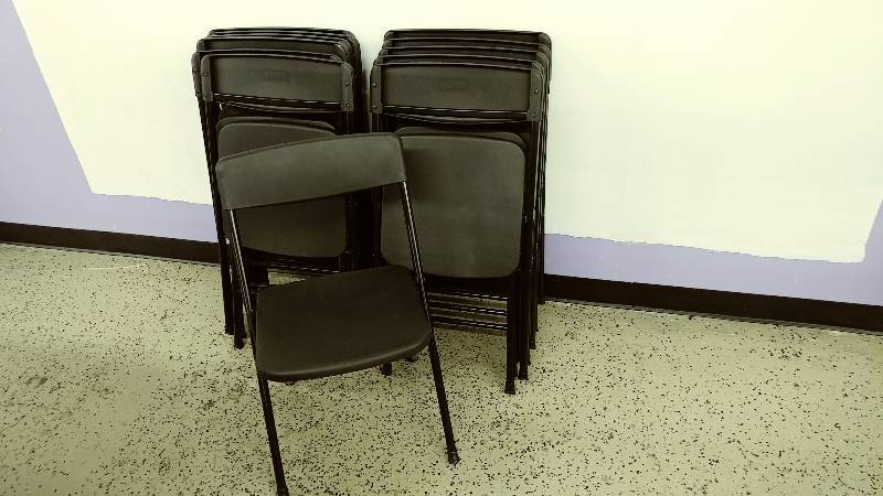 lot 8 image: 12 Black Cosco Folding Chairs