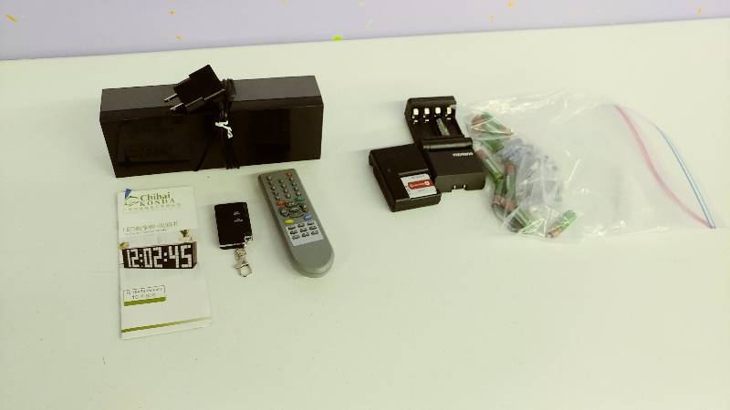 lot 49 image: LED Digital Clock and Rechargeable Batteries