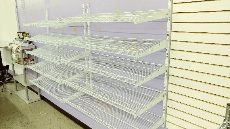 lot 102 image: 2 Metal Wall mounted Shelving Units