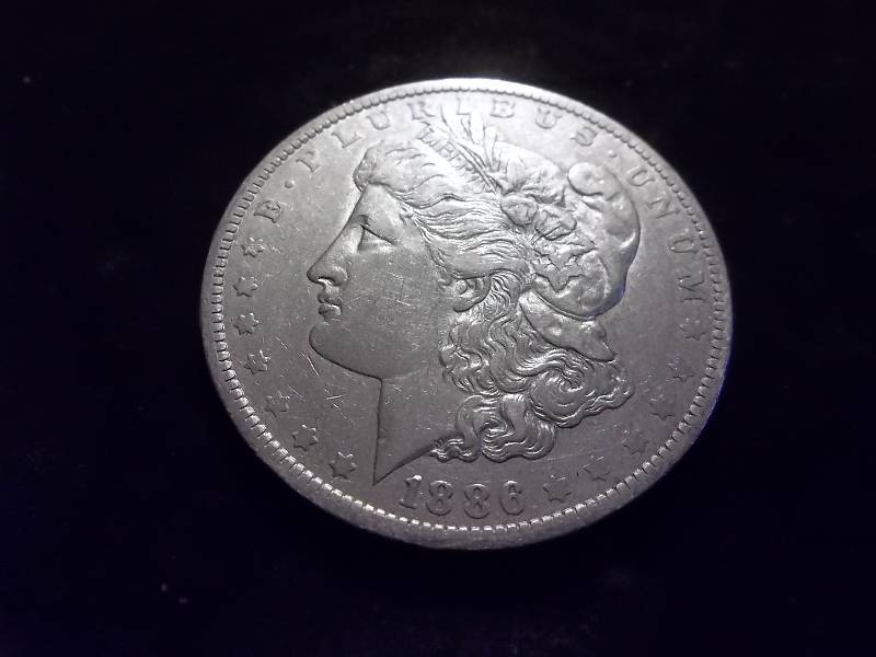 1886 O Morgan Silver Dollar Very High Grade AU
