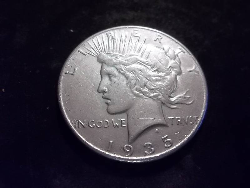 1935  Peace Silver Dollar High