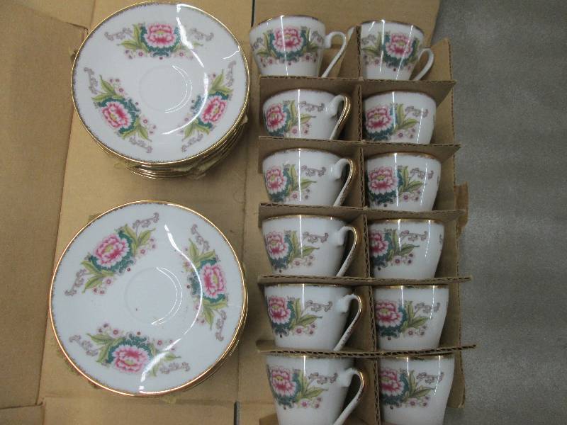 lot 89 image: Collectible Cup & Saucer Set for 12...