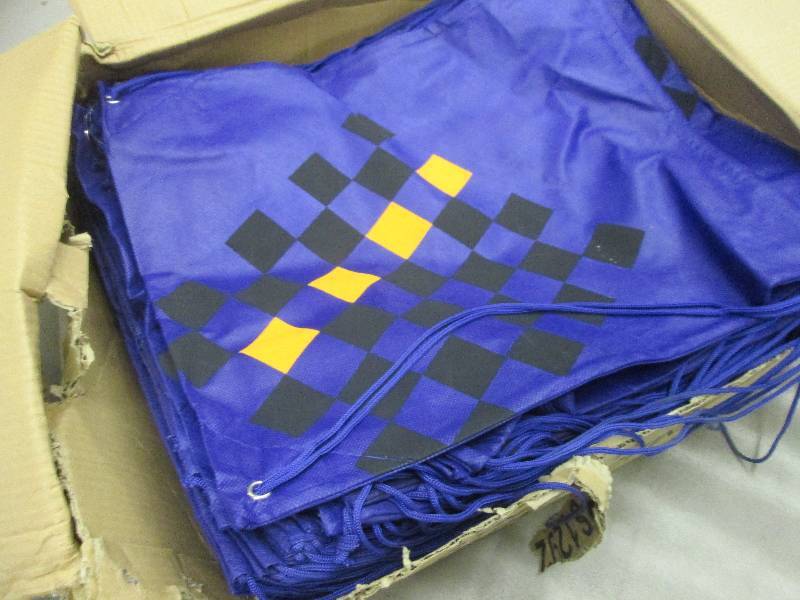 lot 163 image: Box of Checkered Nap Sacks 16x20 in...