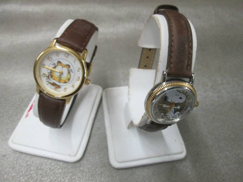 lot 192 image: Garfield & Snoopy Watches...