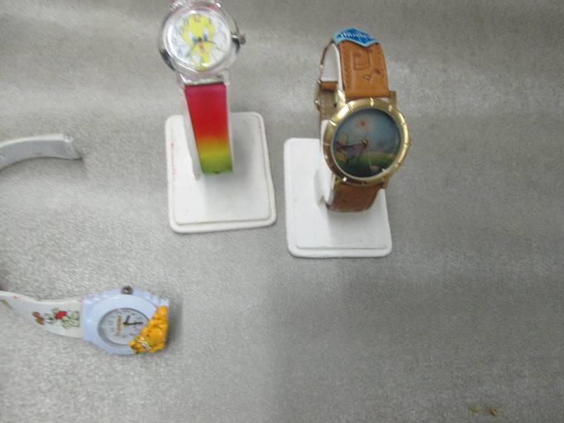 lot 193 image: Musical Winnie the Pooh Watch, Twee...