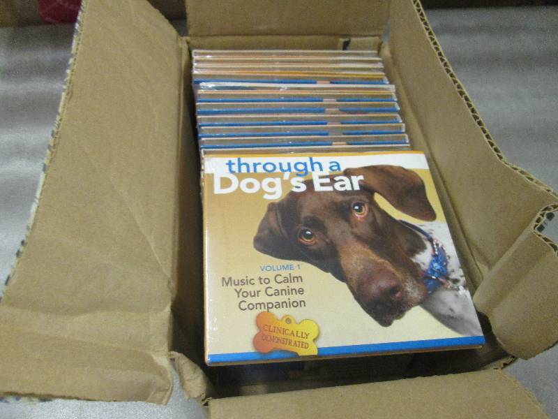 lot 233 image: 5 Boxes of Through a Dogs Ear Mu...