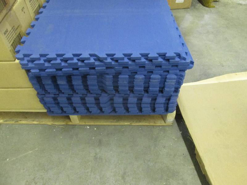 lot 238 image: Stack of Blue Soft Flooring...
