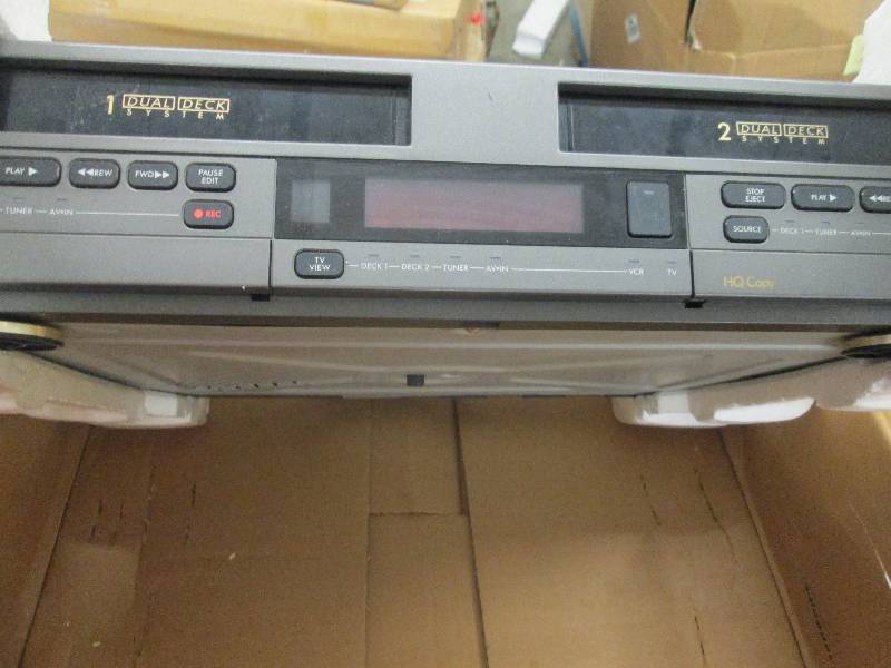 lot 54 image: HQ Copy Dual Deck VCR...