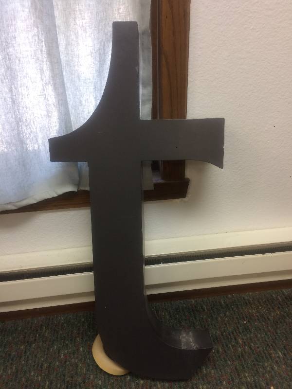 lot 28 image: Graphite Letter T