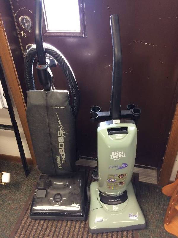 lot 42 image: Step Ladders and Vacuums