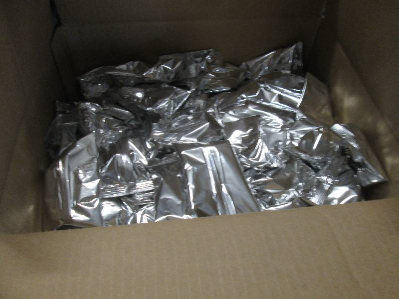 lot 127 image: Box of Beyond Date Sealed Hardees C...