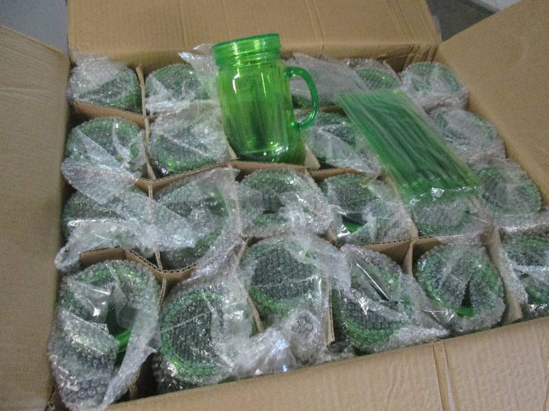 lot 129 image: Case of 24 Insulated Green Mugs wit...