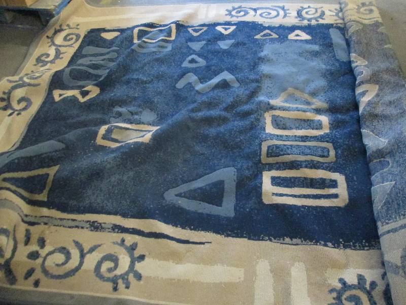 lot 132 image: 94x130 inch TanBlue Area Rug...
