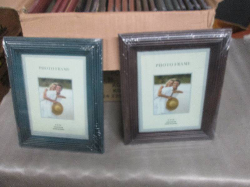 lot 180 image: Case of 24 Assorted Colored 8x10 Ph...