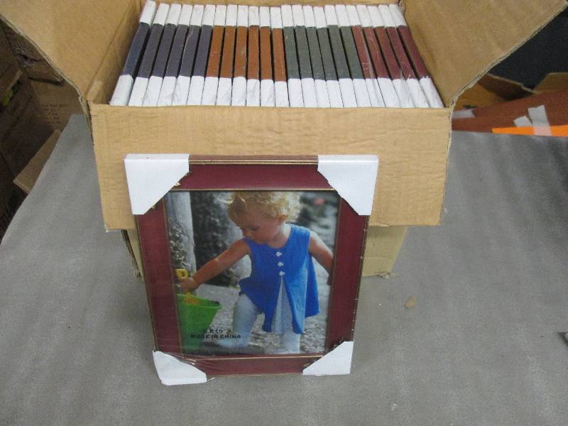 lot 182 image: Case of 24 Assorted Colored 8x10 Ph...