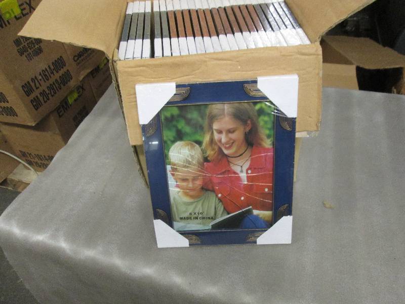 lot 185 image: Case of 24 Assorted Colored 8x10 Ph...