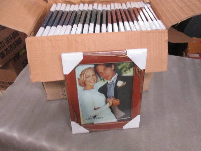 lot 187 image: Case of 24 Assorted Colored 8x10 Ph...