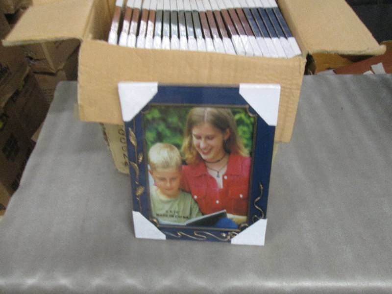 lot 188 image: Case of 24 Assorted Colored 8x10 Ph...