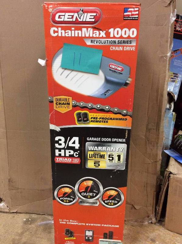 lot 11 image: Genie Revolution Series Chain Max 1000 34 HP Chain Drive Garage Door Opener  Model # 3022-TV New