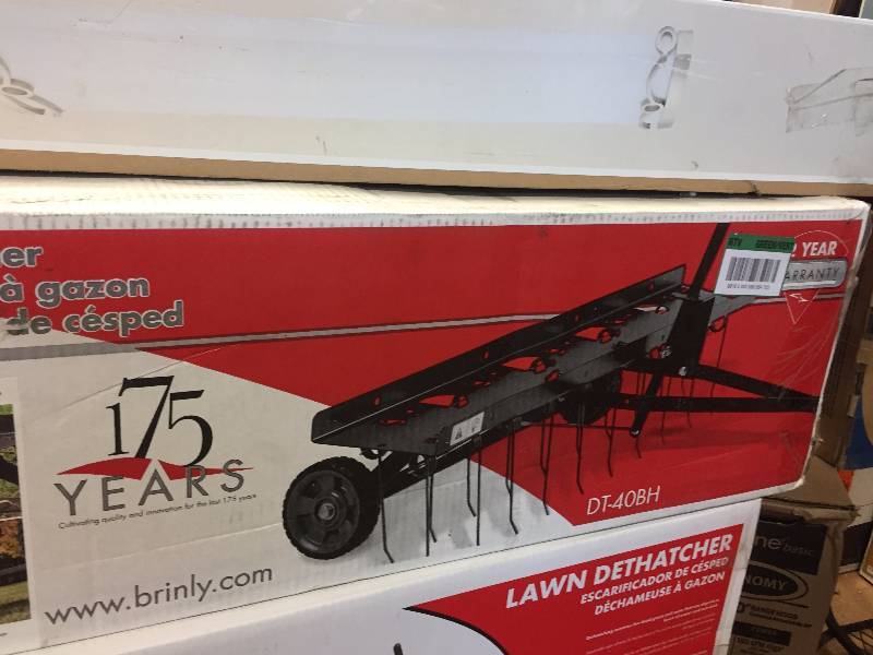 lot 86 image: Brinly-Hardy 40 in. Tow-Behind Dethatcher open box never used