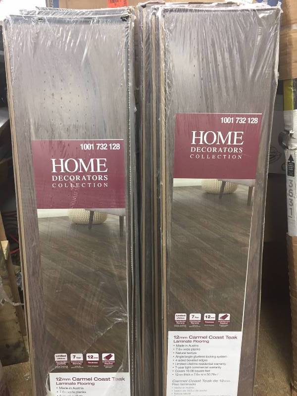 lot 137 image: Set of 9 New cases Home Decorators Collection  Carmel Coast Teak 12 mm Thick x 7 1932in. Wide x 50 2532 in. Length Laminate Flooring (16.08 sq. ft.  case)