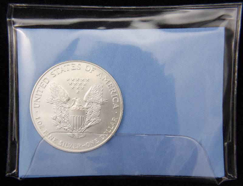 1998 AMERICAN SILVER EAGLE 1 TROY OZ. .999 FINE SILVER DOLLAR IN LITTLETON HOLDER