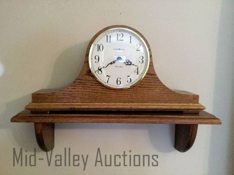 lot 53 image: Howard Miller clock and shelf