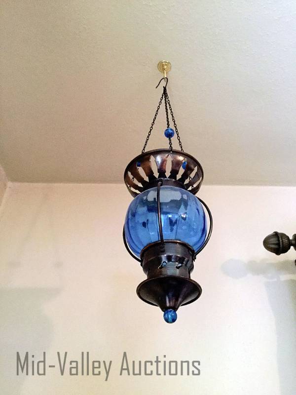 lot 54 image: Blue glass hanging candle holder