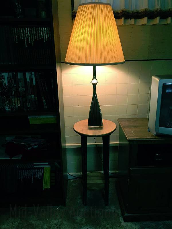lot 103 image: Tall table and lamp