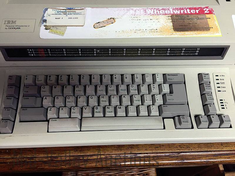 lot 106 image: Typewriter and adding machine