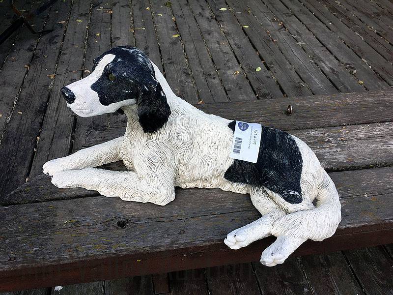 lot 134 image: Black and White decorative dog