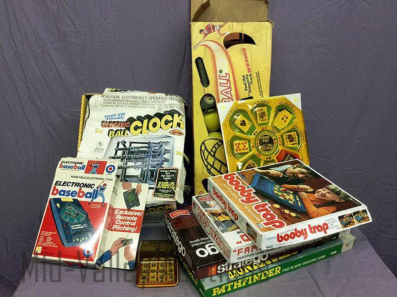 lot 219 image: Electric Ball Clock and games