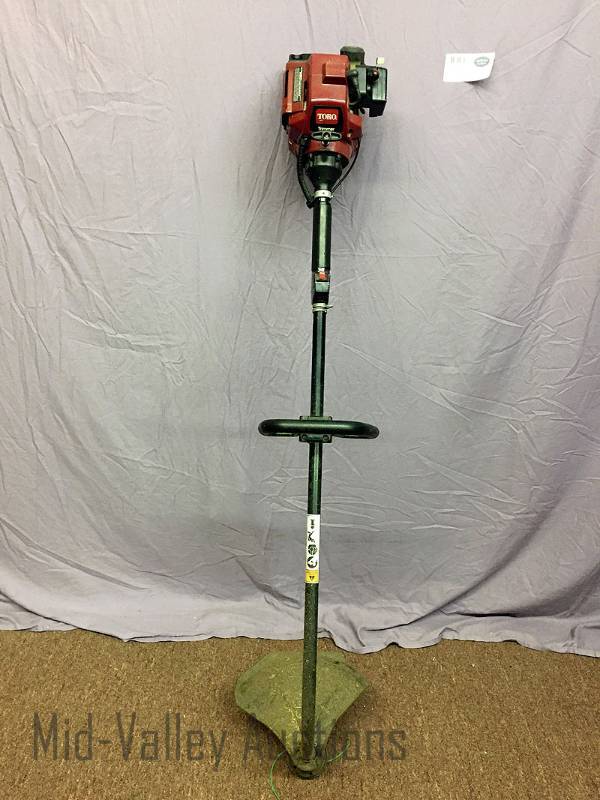 lot 303 image: Toro Gas Weed Trimmer