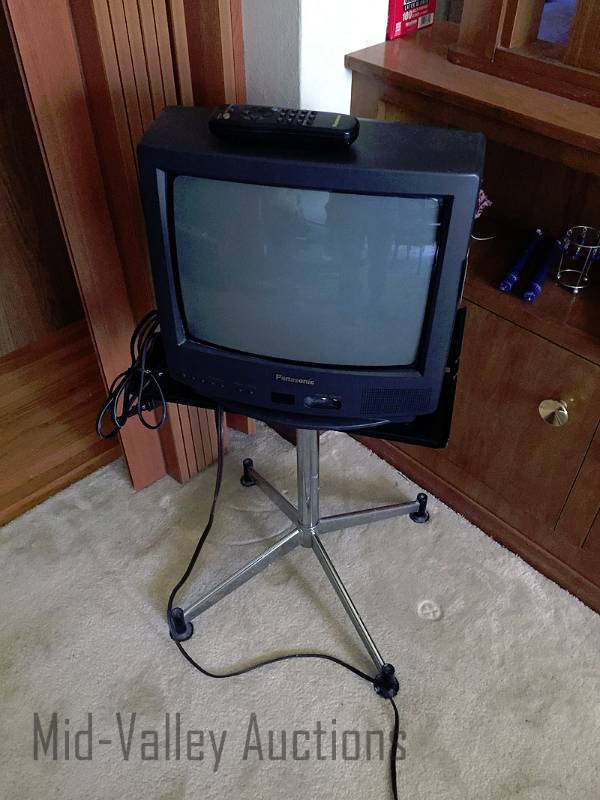 lot 336 image: TV wremote and metal stand