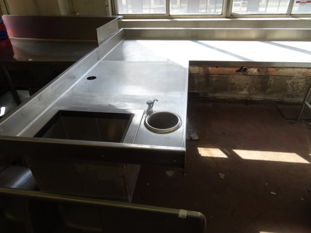lot 62 image: L Shaped Stainless Table. Back Splash