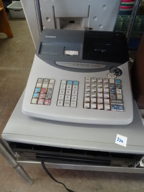 lot 234 image: Casio Cash Register. Brandt Dollar Bill