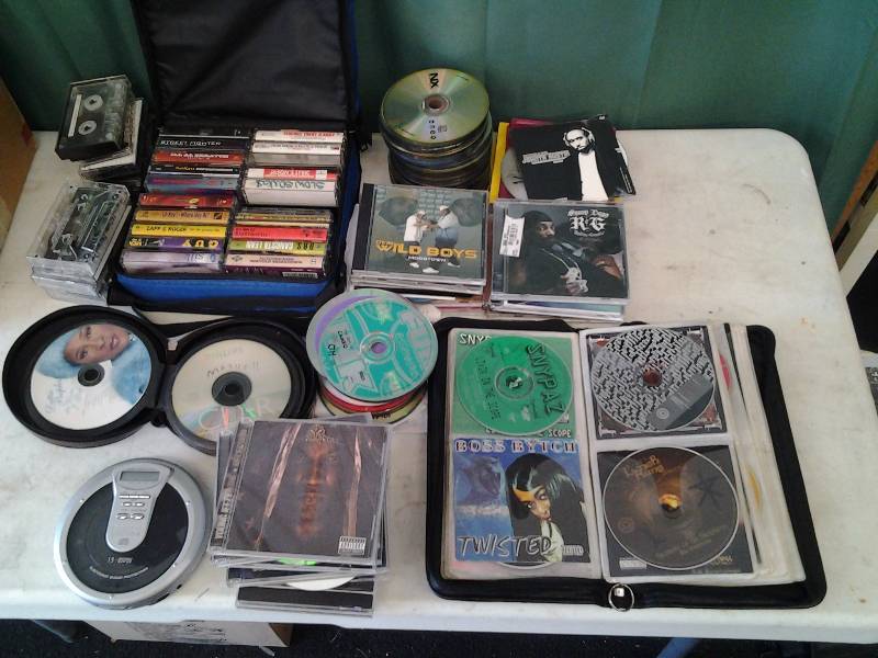 lot 10 image: Lot Of CDs, Personal CD Player, Cassette Tapes (Mostly Rap)