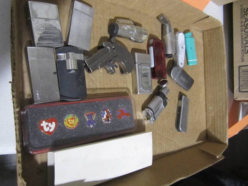 lot 55 image: Lot of vintage lighters and pins...