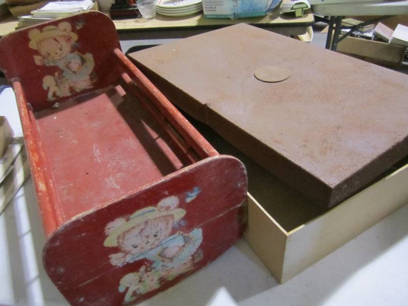 lot 87 image: Vintage doll cradle and Department ...