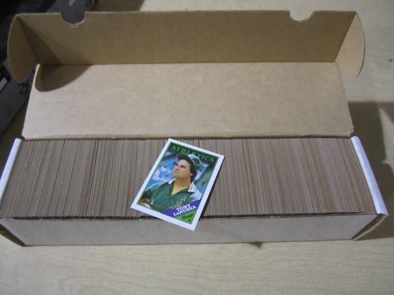 lot 135 image: 1988 Topps baseball appears to be a...