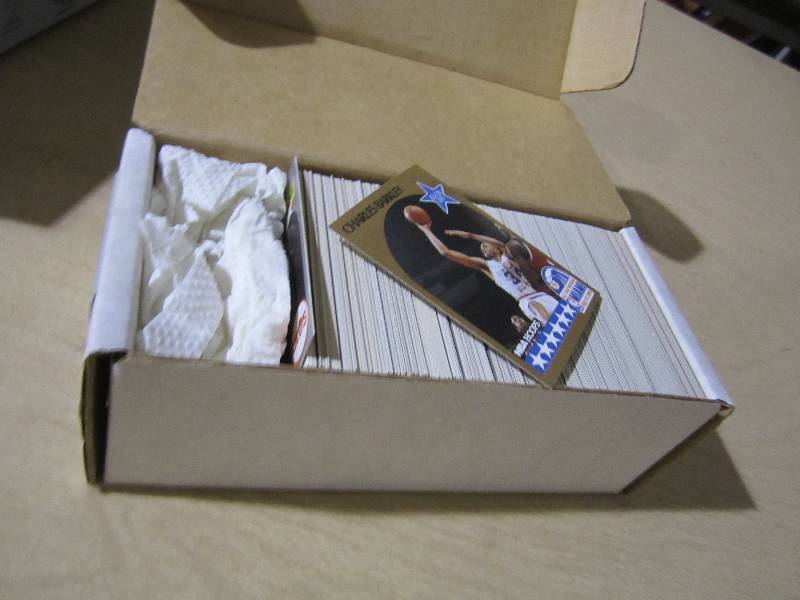 lot 144 image: Box marked NBA Hoops series 1 appea...
